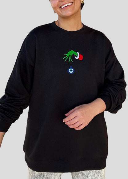 Embroidered Grinch Hand with Evil Eye Ornament Sweatshirts